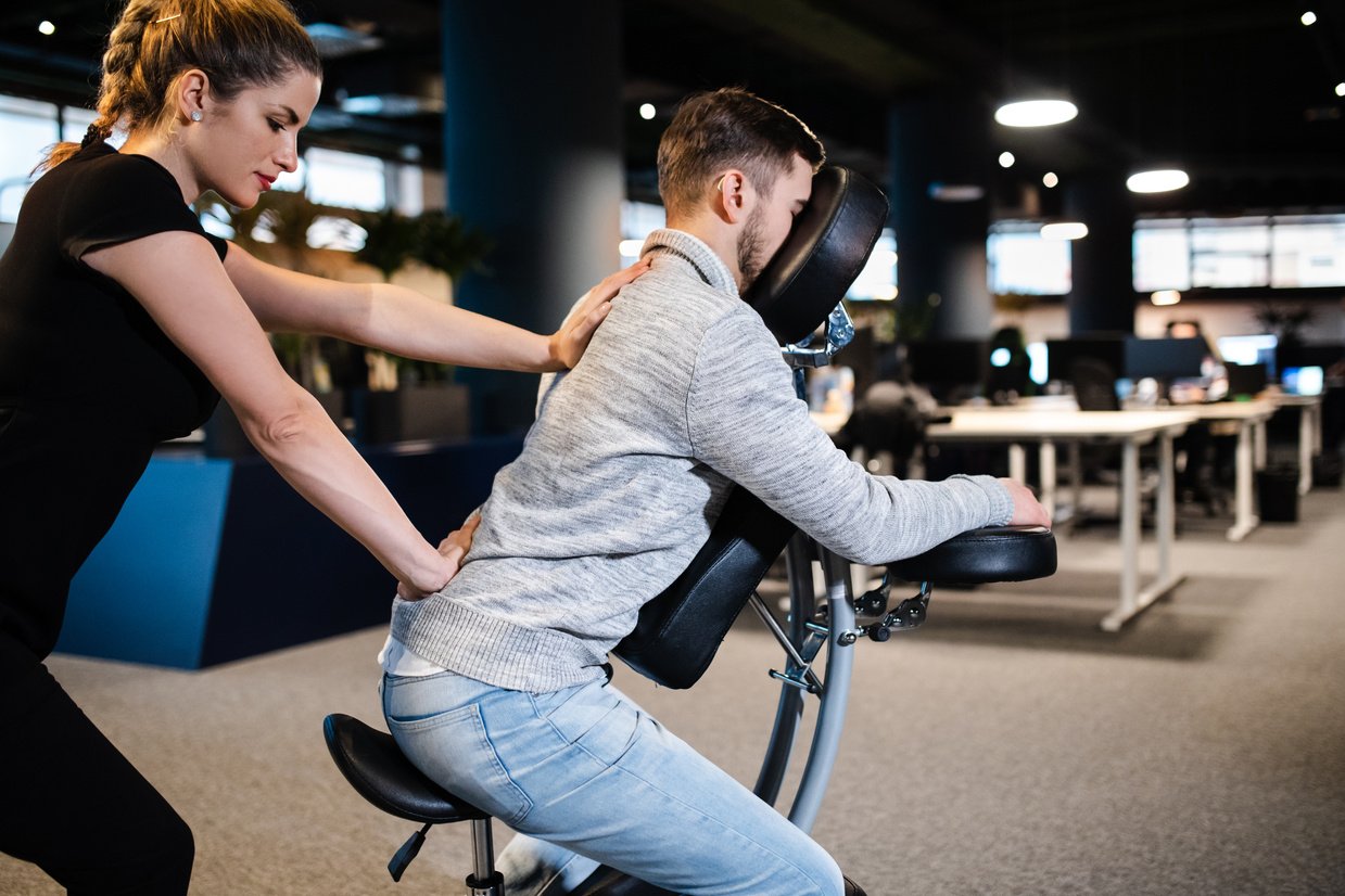 Man Getting a Mobile Chair Massage